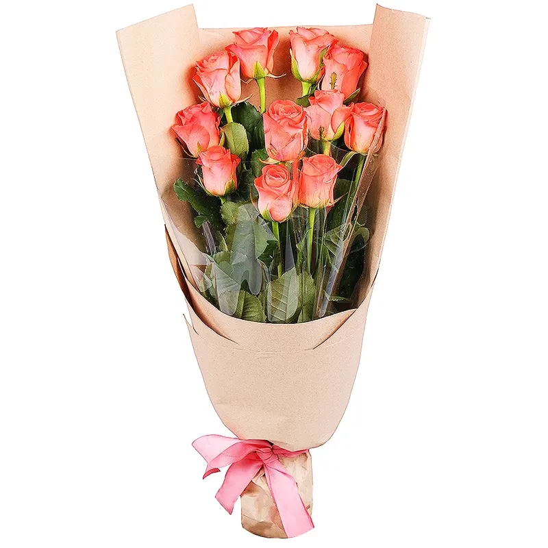 Букет из 11 персиковых роз в крафт
